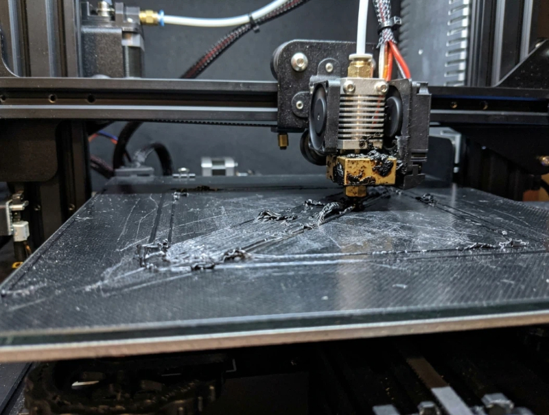 Nozzle height comparison for 3D printing: left shows nozzle too close causing rough squashed lines, middle shows correct height with slightly flattened but clear extrusion lines, right shows nozzle too far causing gaps and no bed adhesion