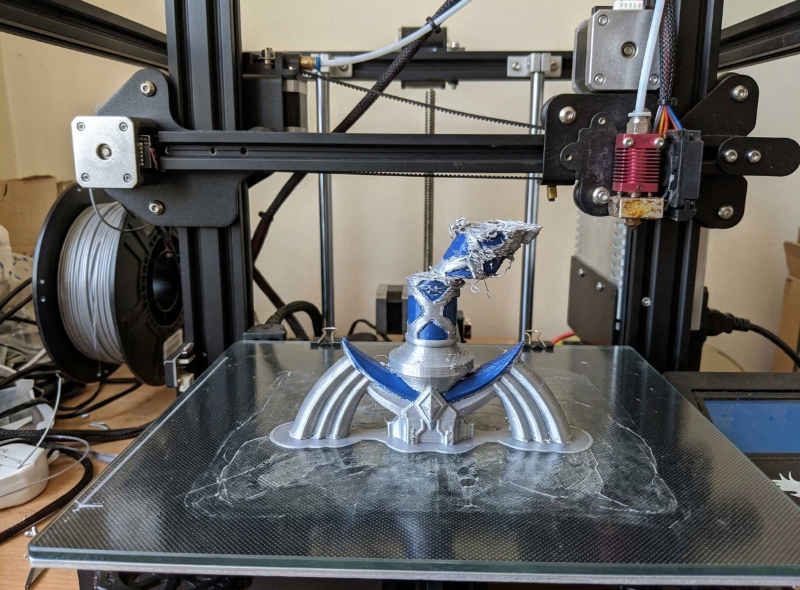 Loose belt causing layer shift on 3D printed prop sword where upper layers suddenly moved several millimeters out of alignment